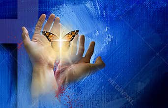 Christian cross with hands setting delicate butterfly free