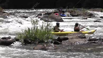 Tight fullscreen static shot of rushing river water