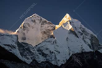 Kangtega mountain peak in a morning sunrise at Dingboche village
