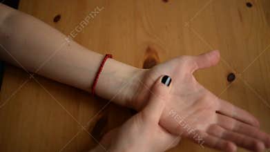 Self Massage of Hands Close Up View.