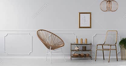 Video of a gold, elegant living room interior with a drawing on gray wall with molding