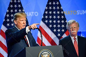 Donald Trump, President of United States of America and John R. Bolton, during press conference at NATO SUMMIT 2018.