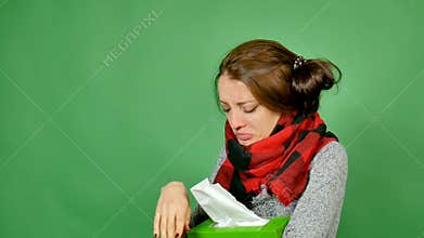 The brunette blows her nose into a napkin. The girl is allergic. Allergic rhinitis, symptoms and treatment of allergic