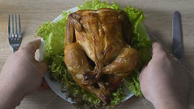 Male going to eat big fried chicken portion at restaurant, overeating problem
