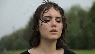 Teen girl in depression in the rain