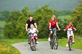 Family riding bicycles