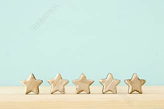 Concept image of setting a five star goal. increase rating or ranking, evaluation and classification idea.