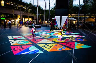 Christmas projections animated on the ground at Customs House Square produced by the City of Sydney.