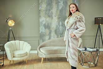 Girl in expensive fur coat
