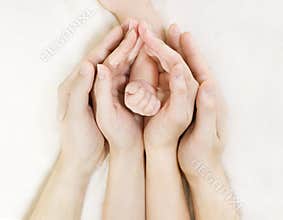 Family Baby hands, Newborn Kid hand into Mother Father Parents hands