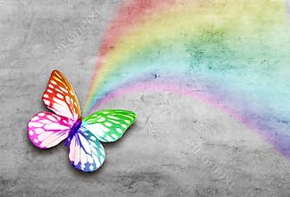 Abstract grunge grey concrete background with colorful rainbow butterfly