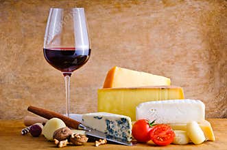 Rustic snack with cheese and wine