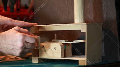 Wooden automaton mechanism close-up