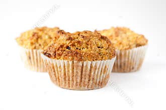 Three gluten free muffins isolated
