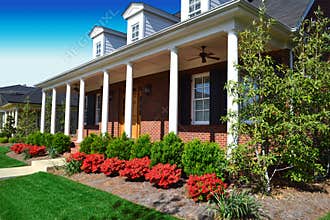 Brick Cape Cod Style Home in the Springtime