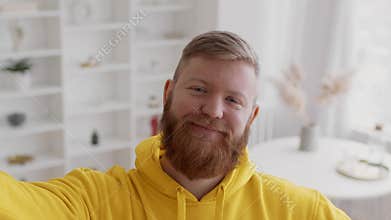 Bearded Man Making Selfie Expressing Different Emotions Posing At Home