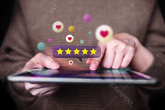 Customer Experiences Concept. Closeup of  Woman Using Digital Tablet to Giving Feedback via the Internet. Positive Review. Client