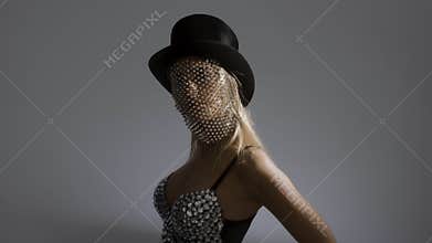 Young woman wearing top hat with sparkly veil and bustier