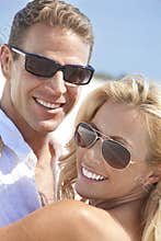 Happy Woman Man Couple In Sunglasses At Beach