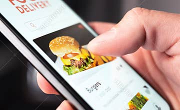 Food delivery app order with phone. Online mobile service for take away burger and pizza. Hungry man reading restaurant menu.