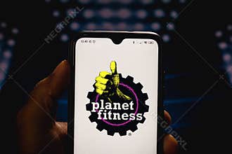 December 14, 2020, Brazil. In this photo illustration the Planet Fitness logo seen displayed on a smartphone