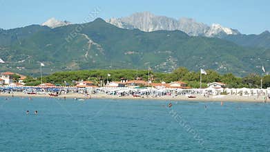 Forte dei Marmi Versilia Tuscany:  sea beach and the pine forest with the Apuan Alps mountains in the background