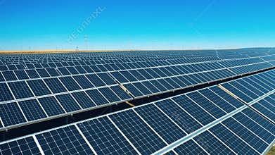 Drone shot of solar panel rows at a solar power facility