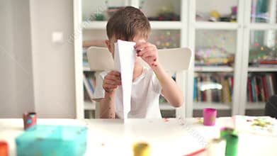 Kid Painting at Kindergarten
