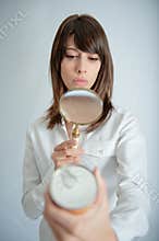 Woman scrutinizing nutrition label