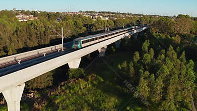 Aerial view of a Sydney Metro train going past