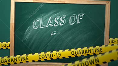 Class of 2021. Lettering in a school blackboard. Covid-19 concept.