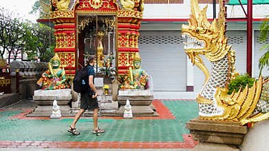 Tourist in Buddhist temple of Chiang Mai Thailand