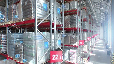 Concept of automation and digitalization of warehouse. A flying near of product rows with infographics and digital