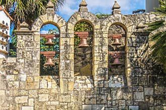 The five  bells on the Arneson River Stage viewed from the River Walk in San Antonio Texas representing the five missions that the