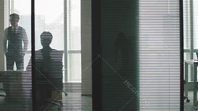 Business people working in modern corporate office
