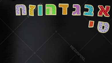 Jewish person organizing the Alphabet Hebrew letters