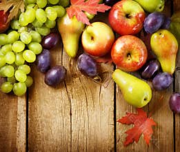 Fruits over wood background