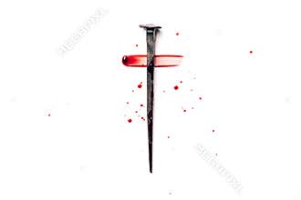 Christian cross made with rusty nails, drops of blood on white background. Copy space. Good Friday, Easter day