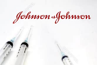 Three syringe next to the Johnson & Johnson Covid-19 vaccine box
