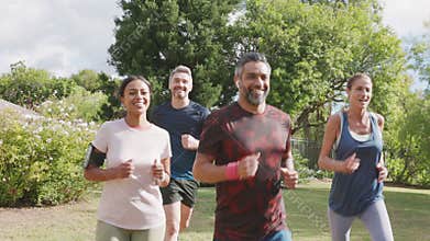Mature people jogging in park