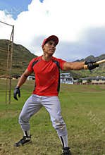 Baseball player talking to the umpire