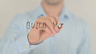 Build Your Network, Man Writing on Transparent Screen