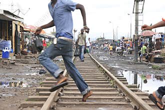 Lonely African boy on crossroads in Africa
