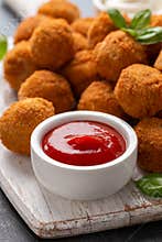 Meat free vegetarian mini picnic scotch eggs with micoprotein and herbs served with ketchup and mayonnaise