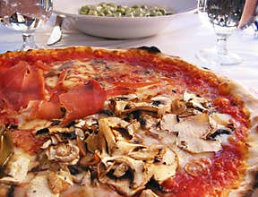 Pizza at roadside cafe in rome