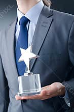 Businessman with star award