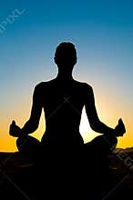 Woman in yoga lotus position