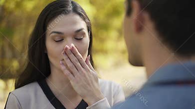Bad breath. Woman covers her nose and turns away
