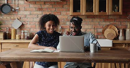 African couple check email feel happy celebrate online auction victory