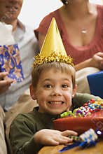 Boy at birthday party.